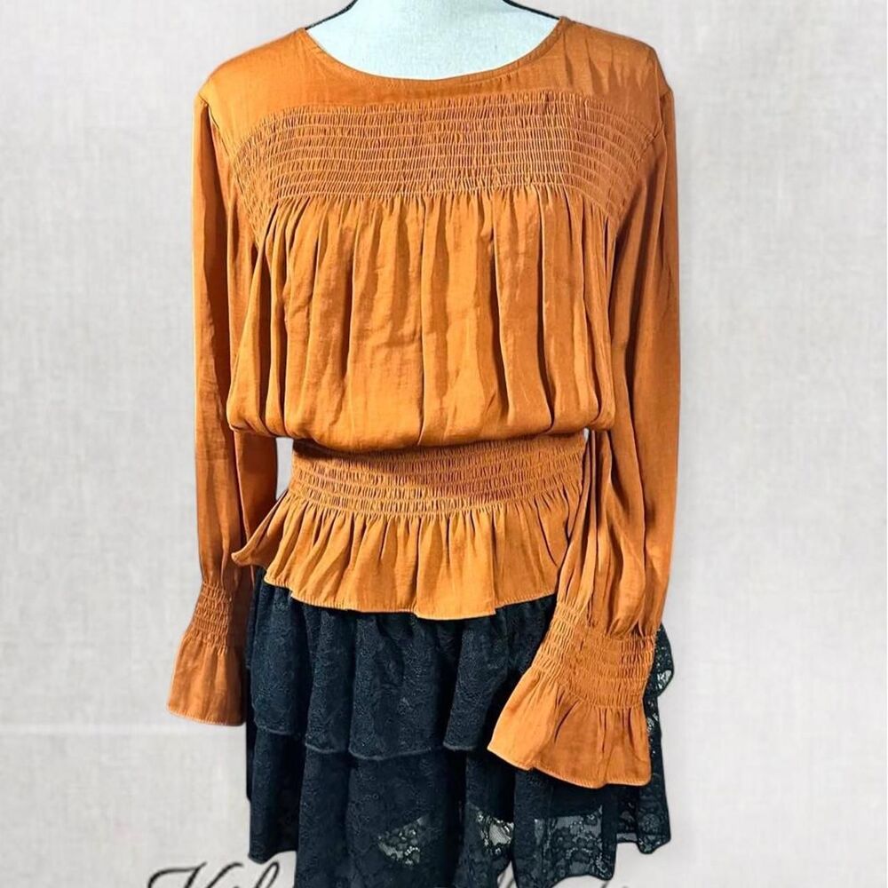 Orange blouse with ruffled sleeves and smocked waist, size M